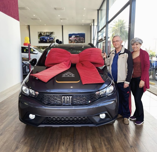Cliente recebendo carro 0km pelo benefício PCD
