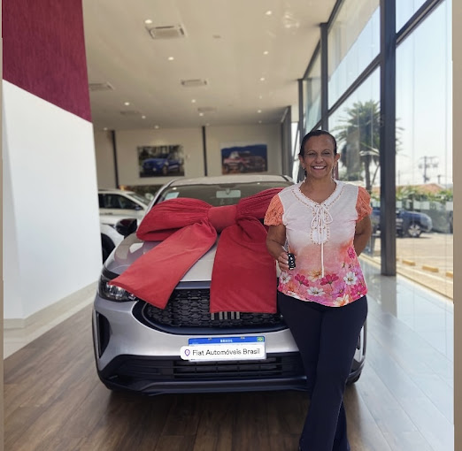 Cliente recebendo carro 0km pelo benefício PCD