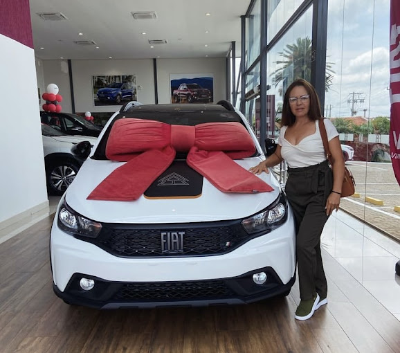 Cliente recebendo carro 0km pelo benefício PCD